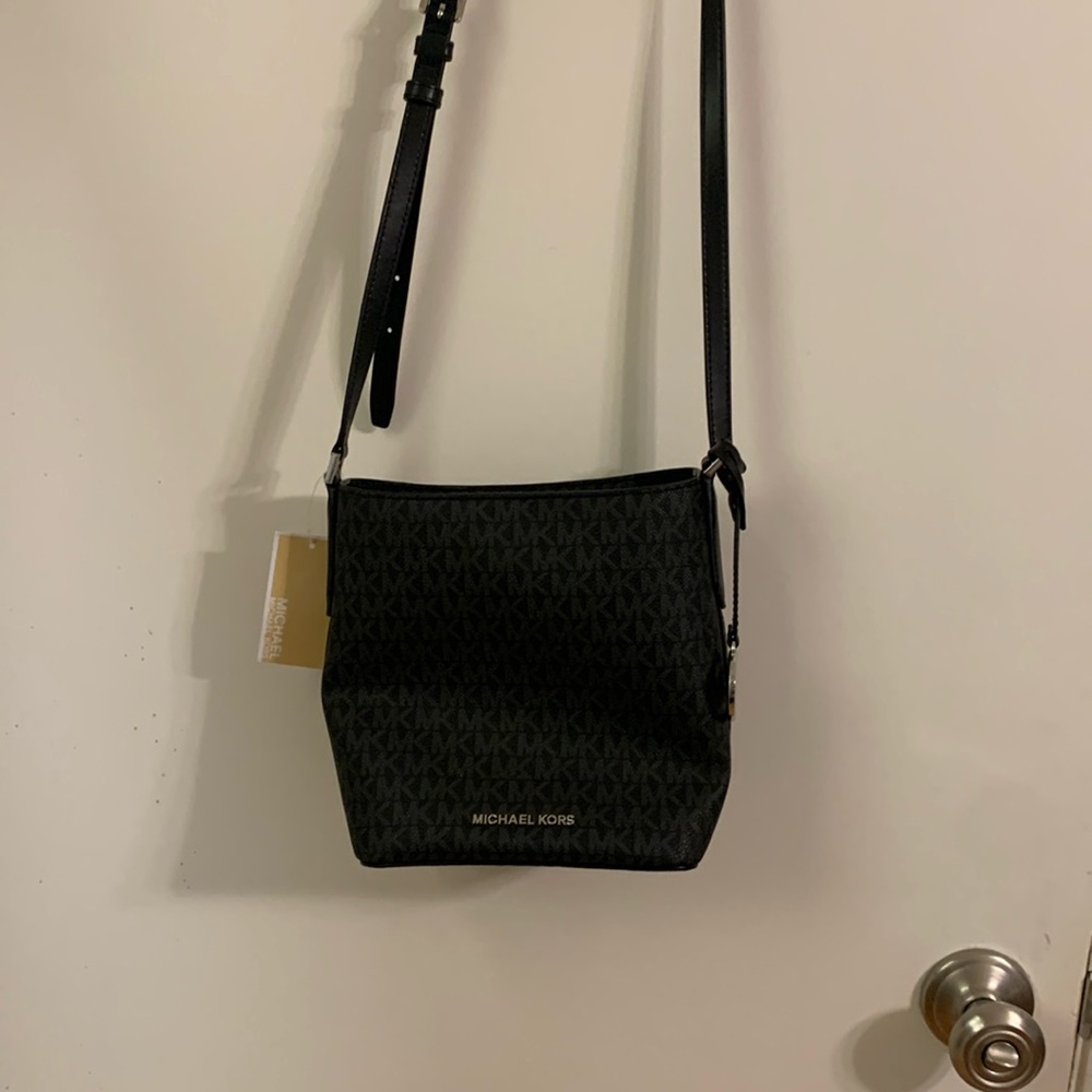 Michael Kors Kimberly style small messenger bucket bag with adjustable strap